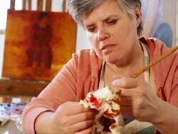 MS TU TD Woman painter in her studio cleaning painting brush / Lamy, New Mexico, United States Stock Footage