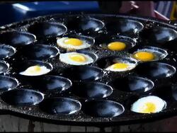 Food Preparation: Frying Quail, Partridge Eggs In Shallow Pan Stock Footage