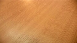 Hand gives dollar to another man Stock Footage