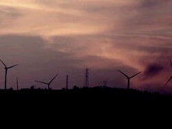 Eolic Power Generators at Sunset Stock Footage