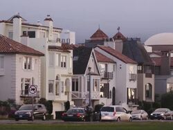 A traffic cop issues a citation. San Francisco marina district, sunset Stock Footage