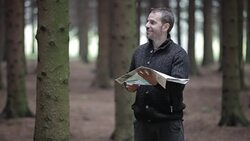 Man with Backpack and map searching directions Stock Footage