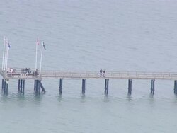  AERIAL MS People roaming on jetty  / Holstein Switzerland, Schleswig-Holstein, germany Stock Footage