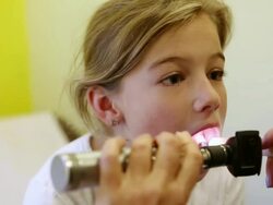 ECU Shot of young girl getting physical exam at doctor's office / Santa Fe, New Mexico, United States Stock Footage