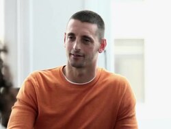 MS DS businessman and businesswoman sitting in discussion at workstation in office Stock Footage