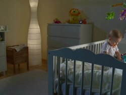 HD CRANE: Sleepless Baby Playing With Toy Stock Footage