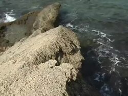 Rocky Coral and Ancient Ruins with Waves Stock Footage