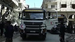 CLEAN : Aid convoy enters Syria's battered Ghouta: Red Cross News Clip
