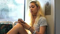 teenage girl texting looks up warily Stock Footage