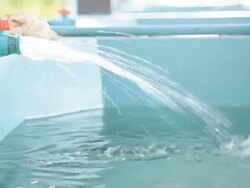 water flow from valve to the tank. Stock Footage