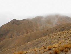 WS View of fog rolling over atlas mountain top / Marrakech, Tensift, Morocco  Stock Footage