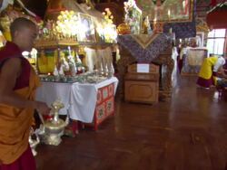 WS  PAN Buddhist monks preparing intricately designed kettles for  ceremony  / Kathmandu, Central, Nepal  Stock Footage