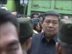 President tours quake disaster area, comments News Clip