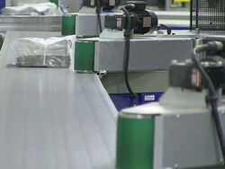 CU Shot of Newspaper bundle at newspaper printing office / Russelheim, Hesse, Germany Stock Footage