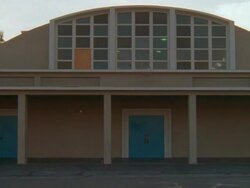 WS ZI Blue double doors of school gymnasium entrance with semi-dome roof / California, United States Stock Footage