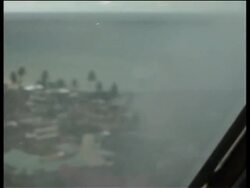 Aerials, ground shots of quake devastation News Clip