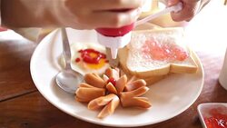 HD: Put the sauce into breakfast Stock Footage