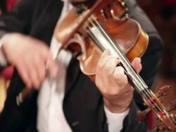 Man playing violin at concert Stock Footage