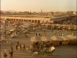 WA High angle, panning left across Marrakech marketplace, Morocco, Africa Stock Footage