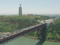 WS AERIAL ZI View of Tagus River with "Cristo Rei" at side / Lisbon, Portugal Stock Footage