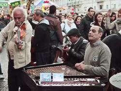 MS Shot of street artists entertaining tourists in Piazza Novena / Rome, Italy Gipsy band plays live music / Rome, Italy Stock Footage