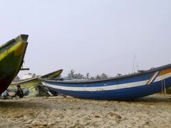 MS PAN Shot of boats at coast / Puri, Orissa, India Stock Footage