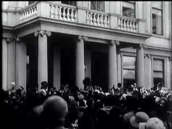 A screen column of World Figures in News of Today. News Clip