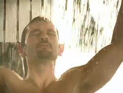 HD SLOW MOTION: Man Relaxing Under Waterfall In Health Resort Stock Footage