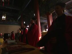 Priests chant and perform at a ceremony at Bai Yun Guan Temple in Beijing. Stock Footage
