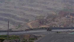 Trucks being transported, open iron ore Stock Footage
