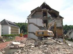 WS Demolition of apartment block / Saarburg, Rhineland-Palatinate, Germany Stock Footage