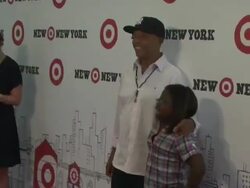 Russell Simmons and guest at the Target Celebrates Opening Of East Harlem Location With Star-Studded Party at New York NY.  Stock Footage