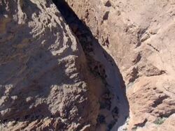 Aerial steep sided canyon in the Judea Desert, Israel Stock Footage