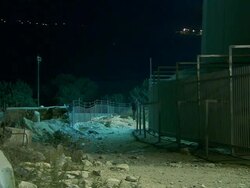 WS View of people waiting and praying at Israelian-palestinian frontier around fire camp / Israel Palestine, Israel Stock Footage