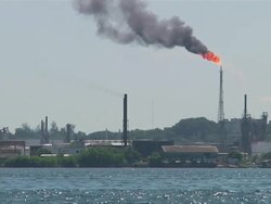 MS Fire burning from top of oil refinery / Havana, Havana, Cuba Stock Footage