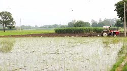 Farmer ploughing field Stock Footage