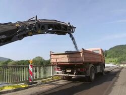 MS LA Shot of bridge construction site preparing demolition of old bridge at Saar river / Wiltingen, Rhineland Palatinate, Germany Stock Footage