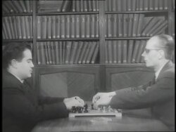 Two blind men play chess. News Clip