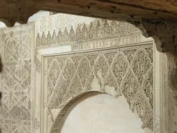 LS details of arabesque stone carvings seen through one of the arches of the women's gallery Stock Footage