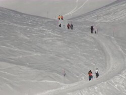WS Hiker walking up at bernese alps in winter / Grindelwald, Bernese Oberland, Switzerland Stock Footage