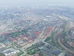 WS AERIAL View of south copenhagen and railway tracks / Copenhagen, Denmark Stock Footage