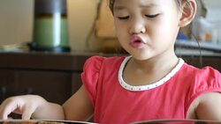 Little Girl Practices Reading Book Stock Footage