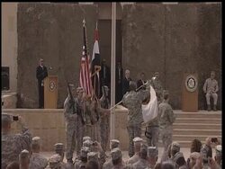 The U.S. military has formally shut down the war in Iraq, officially retiring the flag of U.S. Forces-Iraq. Troops lowered the flag and wrapped it in camouflage, formally "casing" it, according to Army tradition. News Clip