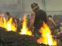 MS Shot of participators playing in blacksmith competition at Calgary Stampede / Calgary, Alberta, Canada Stock Footage