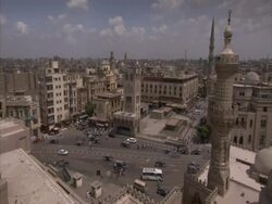 Locked off shot of arabic city skyline with street in foreground, Al Ahzar, Egypt, (sound available) Stock Footage
