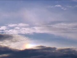 CLOUDS SPEEDED UP 027 & FALSE SUN Stock Footage