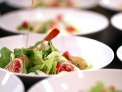 HD: Pouring dressing onto salad Stock Footage