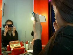 MS Mongolian artists preparing themselves for performance / Ulaan Baatar, Tuv, Mongolia Stock Footage