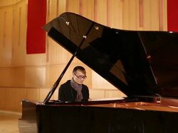 Asian man play piano Stock Footage