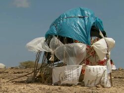 MS Shot of tents in white and blue plastic bags / Djibouti Stock Footage